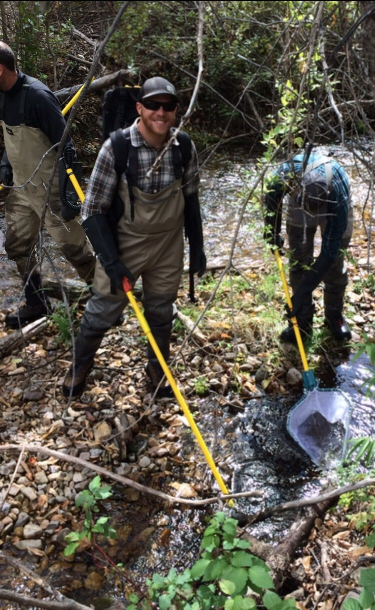 BLM Biological Technician Nic Carlson works in the field