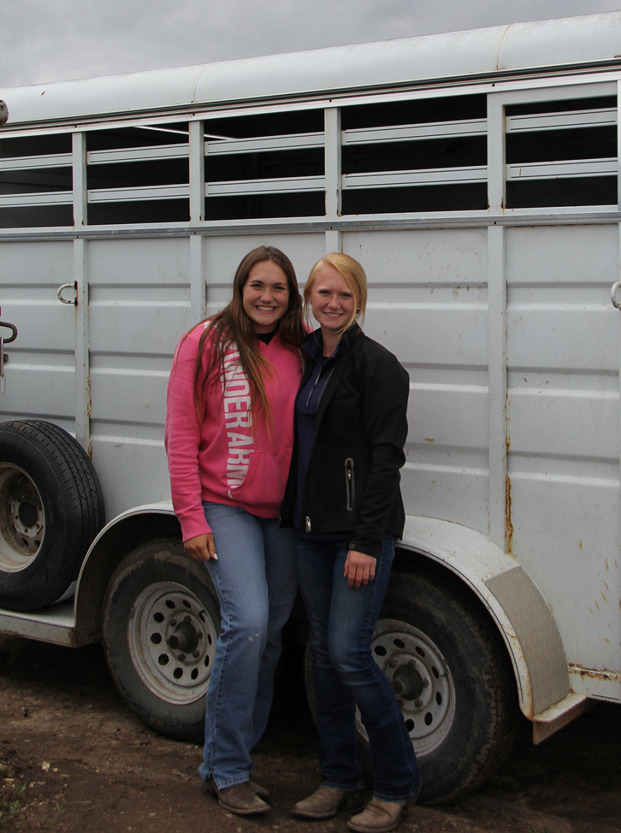 Faith Bannister and Claire Jordan of Wichita with their horses loaded. 