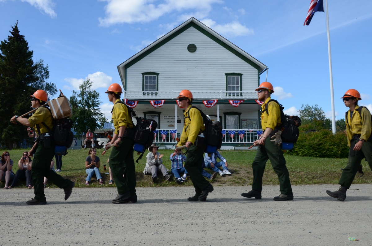 Chena Interagency Hotshot Crew march in the Eagle Fourth of July parade.