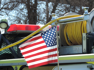 American Flag waves from BLM fire Engine