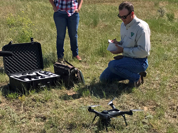 Readying the drone for flight.