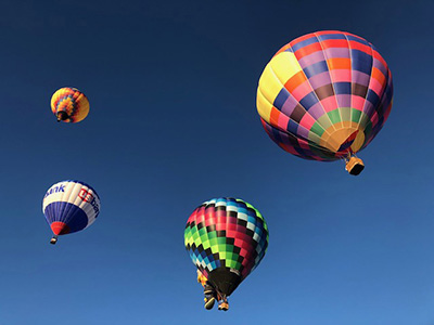 Balloons drifting over the park at the 2018 Albuquerque International Balloon Fiesta