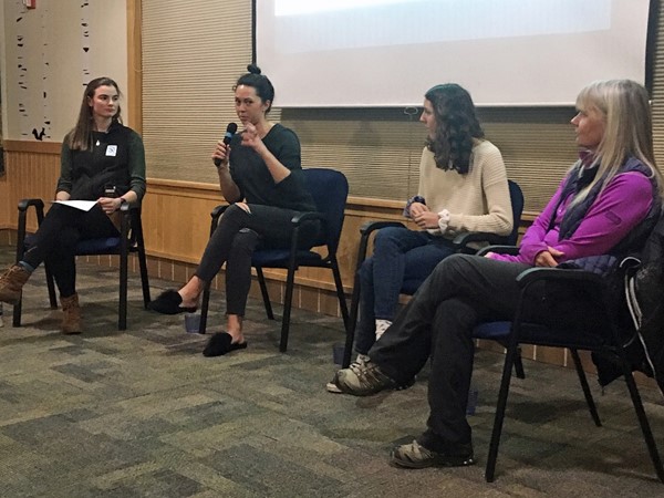 SCA intern Sabrina Farmer (far left) moderated a panel discussion before the start of the No Man's Land Film Festival. 