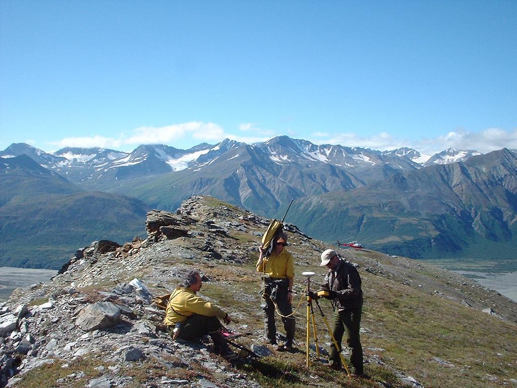 BLM employees conducting land surveys on a mountain, BLM photo