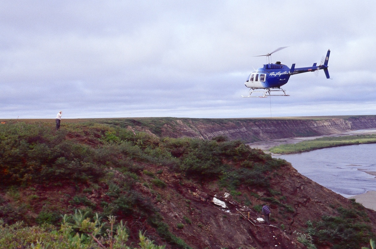 Helicopter approaches dig site where Dr. Anthony R. Fiorillo and his team have uncovered fossils which would be later identifed as Nanuqsaurus hoglundi. Photo courtesy of Dr. Anthony R. Fiorillo and the Museum of Nature and Science in Dallas.