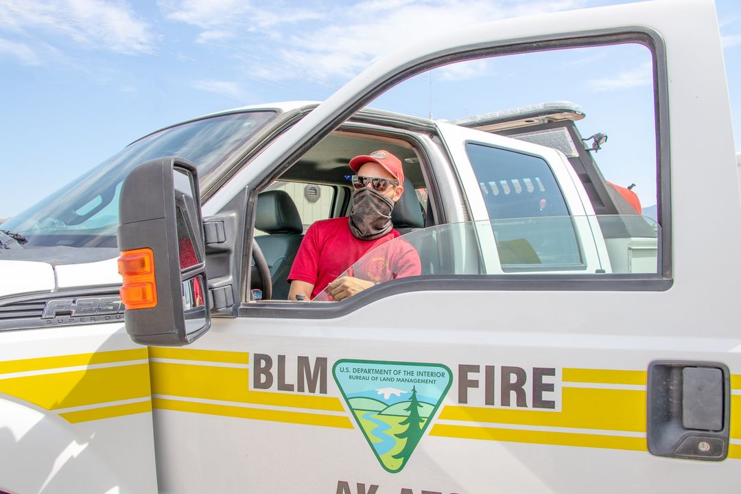 Man sitting inside truck