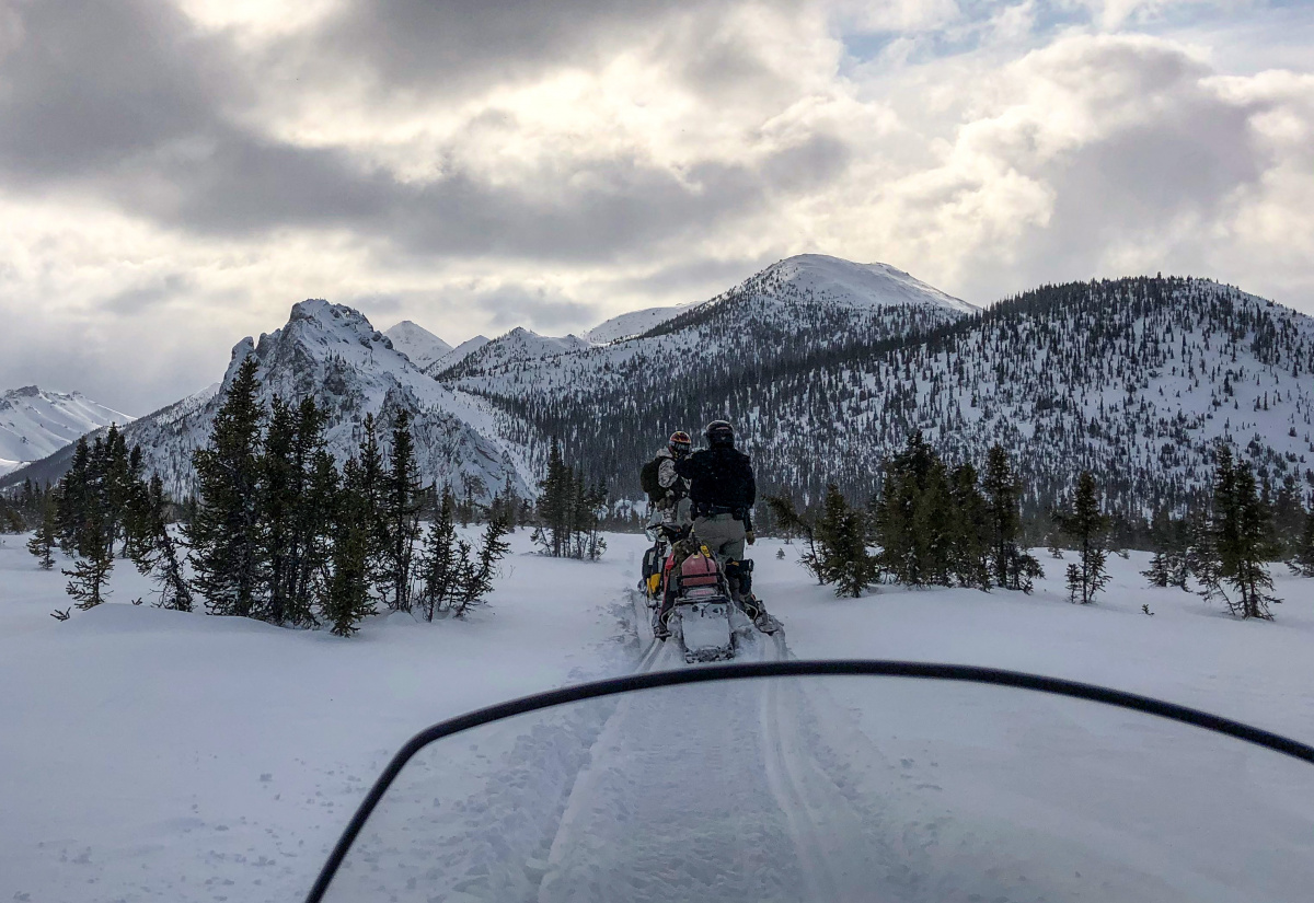 Rescuers riding snow machines