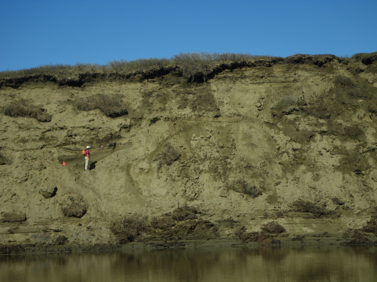 Woman standing along a bluff