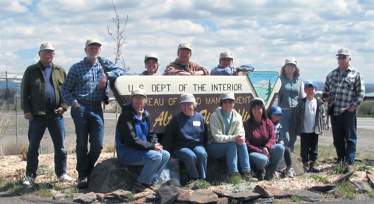A group of people stand near the BLM Alturas Field Office sign during the California Archaeology Site Stewardship Training in Alturas, CA. BLM photo.