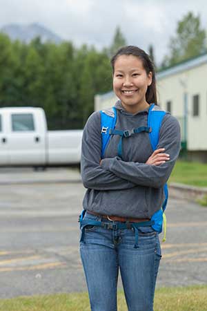 ANSEP intern Jessica Mute poses in front of the BLM Anchorage Field Office.