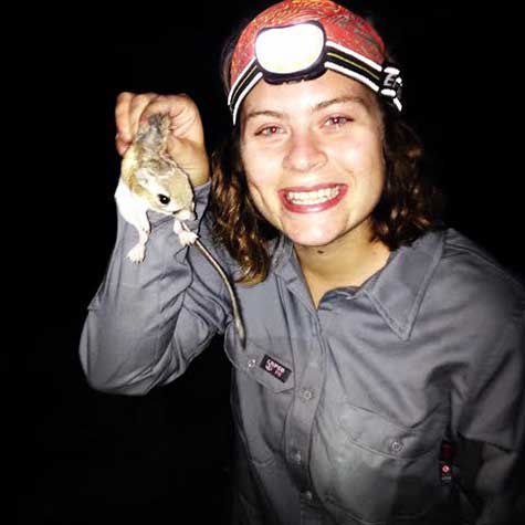 BLM California Intern Tiera Arbogast holds a kangaroo rat.