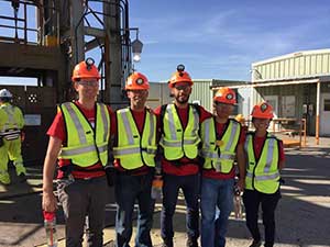 HACU interns in the field.