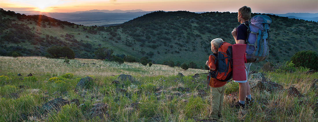 Father and son watch the sunset from the Continental Divide Wilderness Study Area. Photo by Bob Wick, BLM.