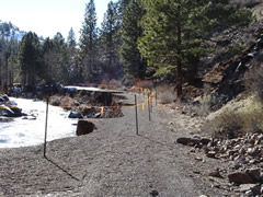 March 2017 winter storms wash out a section of the Bizz Johnson Rail Trail near the Susanville River.  Photo by Stan Bales, BLM. 