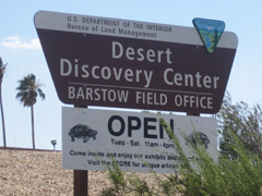 A large brown BLM sign for the Desert Discovery Center (BLM Photo)
