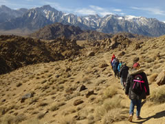 A hike at the Alabama Hills.  Photo by David Kirk, BLM.