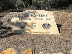 A stone memorial marks the location of the Luke Sheehy Memorial Fitness Park. (Bill Kuntz/BLM)