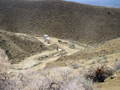 Dirt roads through a dry hilly area.