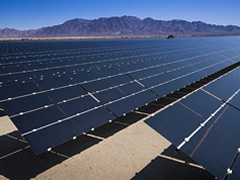 Solar panels in the desert. Photo by Tom Brewster Photography.