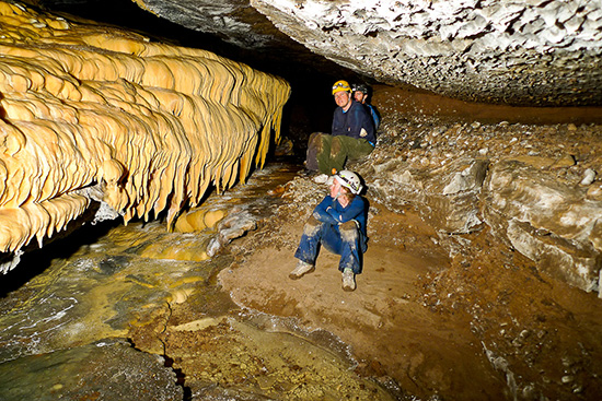 Group of cavers resting in BLM managed cave