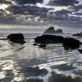 photo of ocean with rocks