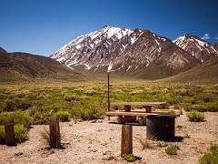 A picnic table and fire pit. Photo by Jesse Pluim/BLM