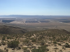 a solar array on a desert valley floor. Photo by Jason Woods/BLM.