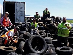 Volunteers accept used tires.