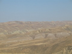 Dry grass hills with a clear blue sky. Photo by Michael Westphal/BLM.