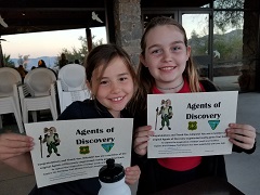 Two sister show off their Agents of Discovery certificates. Photo by Tracey Albrecht, BLM.