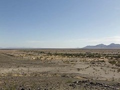 Image of bare desert floor on a clear day. Photo courtesy of URS Corporation.