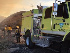 Neon green fire engine in the desert. Photo by Paul Gibbs/BLM.