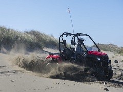 A UTV whips up sand on the beach. Photo by John Off-highway vehicle enthusiasts can find room to play in the sand at Samoa Dunes along the north jetty of Humboldt Bay near Eureka.    Photo by John Ciccarelli, BLM.