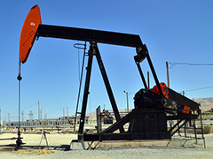 Oil derrick in an oil field. Photo by John Ciccarelli, BLM