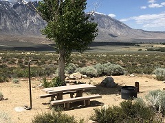 Camp ground against the towering Sierra Nevada Mountains. Photo by Serena Baker, BLM.