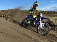 A OHV motorcycle rider at Samoa Dunes, north spit, Humboldt Bay.