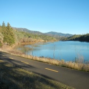 photo of paved trail along a reservoir  