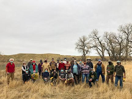 Group photo of volunteers who planted cottonwoods along the Upper Missouri River Breaks