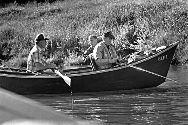 In a 1988 photo, Vice President George Bush fishes on the Rogue River