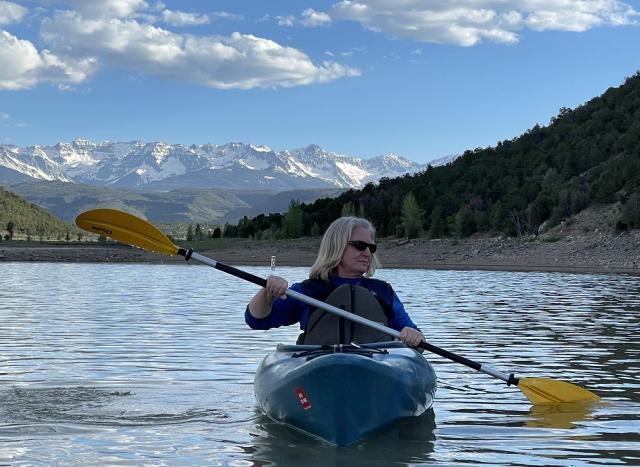 Woman Kayaking in Colorado.