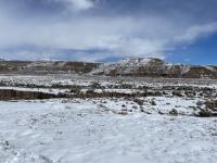 In Pinedale, Wyo. snow covered Wildcat Canyon Stock Pond Dam