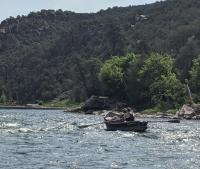 Boat floating down the Green River