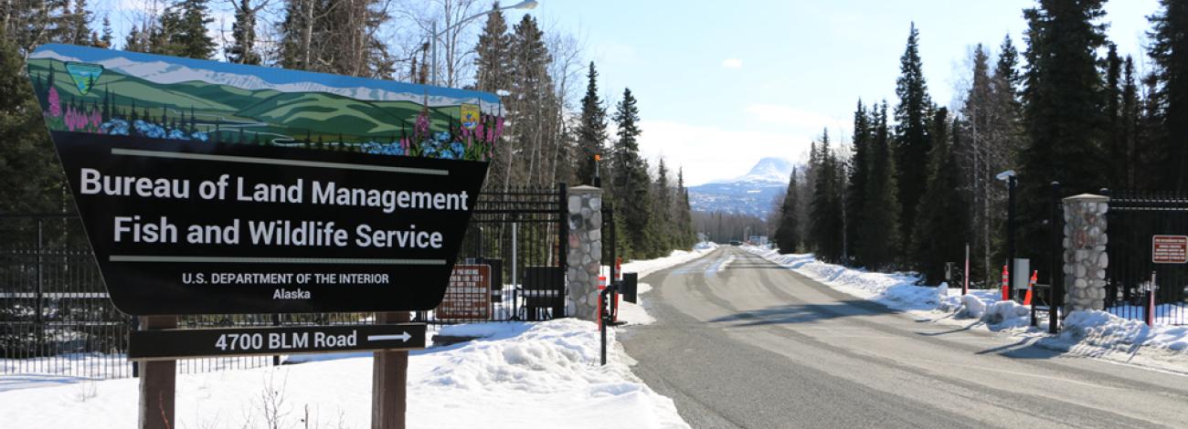 Office sign outside of Anchorage District and Field Office in the winter