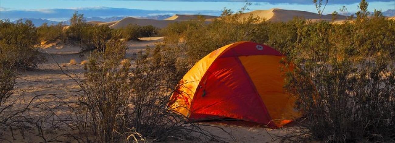 Orange tent in the desert. (BLM Photo)