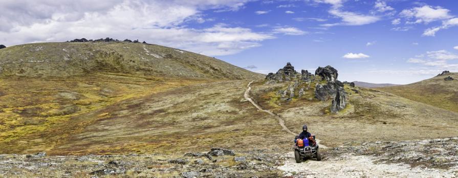 OHV user riding on trail in Quartz Creek in the White Mountains National Recreation Area