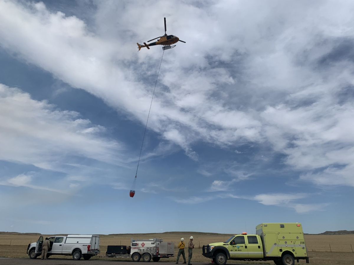 Firefighting helicopter with water bucket