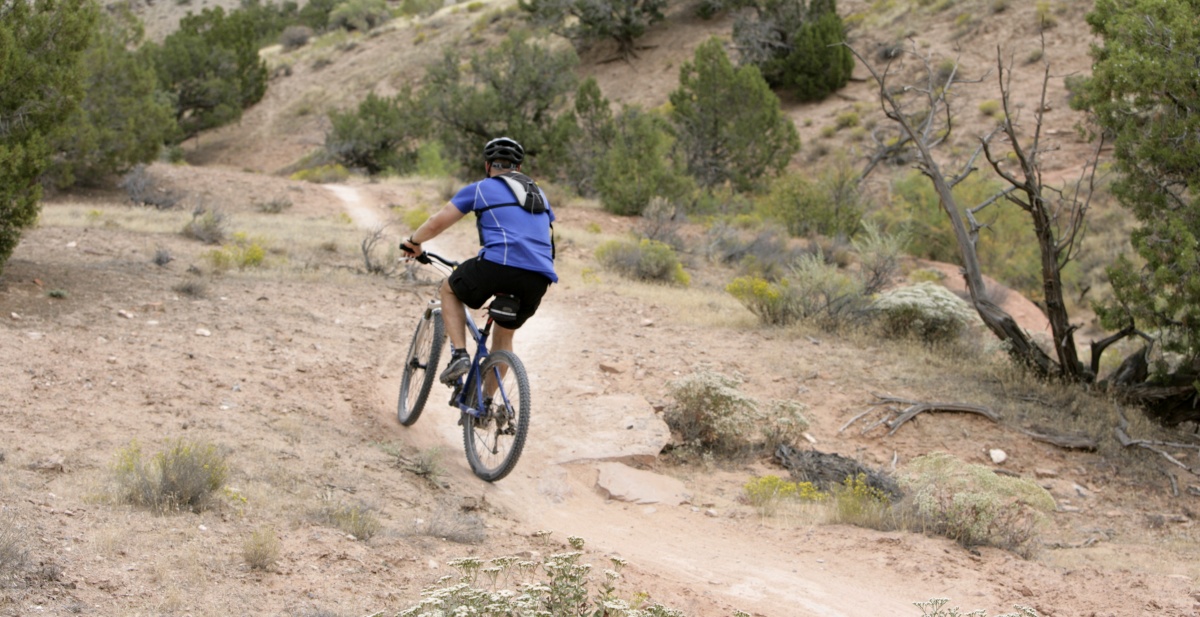 Bike rider at Kokopellis Trailhead