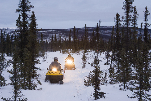 two snow machiners on the trail in the White Mountains National Recreation Area