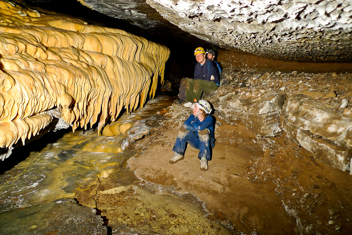 Members of the Fort Stanton Cave Study Project in the Midnight Creek Passage, in the Snowy River Complex, 11 miles from entrance.