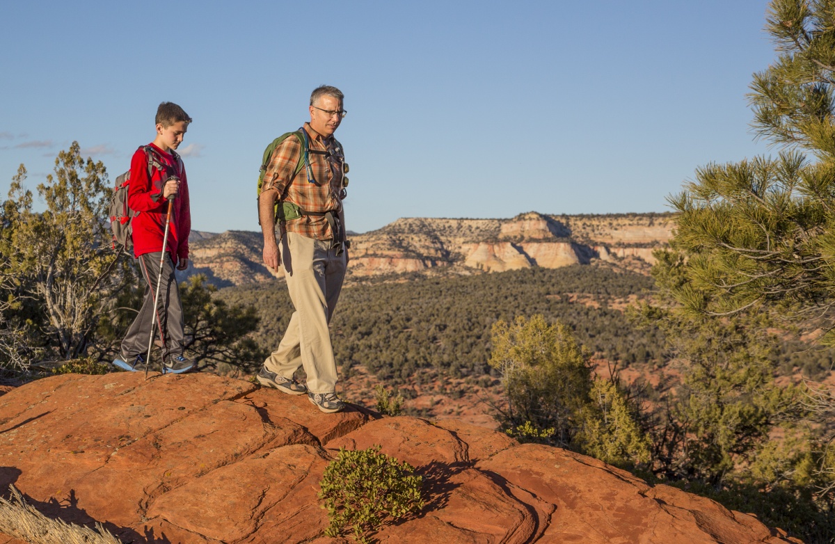 A father and son hike at Parunuweap WSA.